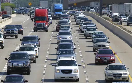 Drivers work their way out of Dallas during rush hour, July 1, 2016. The number of traffic deaths on U.S. roadways fell slightly during the first nine months of 2022, but pedestrian and cyclist deaths continue to rise. (AP Photo/LM Otero, File)