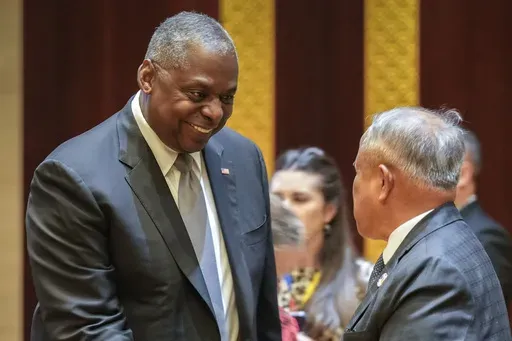 CORRECTING NAME OF BRUNEI DEFENCE MINISTER- U.S. Defence Secretary Lloyd Austin, left, shakes hands with Brunei's Defence Minister Halbi bin Haji Mohd Yussof during the ASEAN Defence Ministers' informal Meeting in Vientiane, Laos, Wednesday, Nov. 20, 2024. (AP Photo/Anupam Nath)