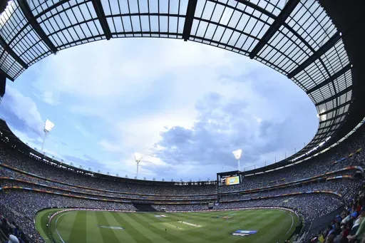 This image taken with a fisheye lens shows a general view of the Melbourne Cricket Ground during the Cricket World Cup pool B match between South Africa and India in Melbourne, Australia, Sunday, Feb. 22, 2015. (AP Photo/Theo Karanikos, File)
