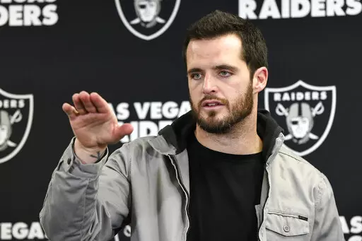 Las Vegas Raiders quarterback Derek Carr meets with reporters after an NFL football game against the Pittsburgh Steelers in Pittsburgh, Saturday, Dec. 24, 2022. Former Raiders quarterback Derek Carr has agreed to a four-year contract with the New Orleans Saints, two people familiar with the agreement said Monday, March 6, 2023. (AP Photo/Don Wright, File)