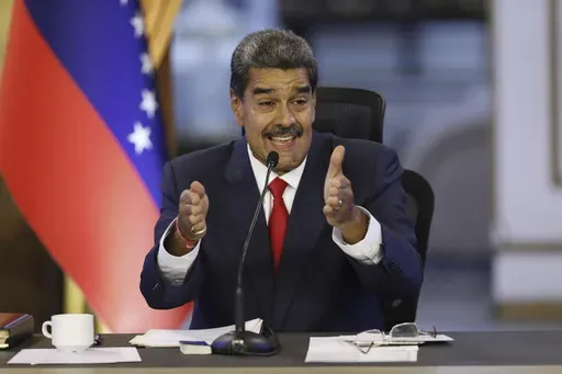 Venezuelan President Nicolas Maduro speaks during a press conference at the Miraflores presidential palace, in Caracas, Venezuela, Friday, Aug. 2, 2024. (AP Photo/Cristian Hernandez)