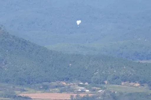 North Korean balloons are seen from the Unification Observation Post in Paju, South Korea, near the border with North Korea, on Oct. 4, 2024. (AP Photo/Lee Jin-man, File)
