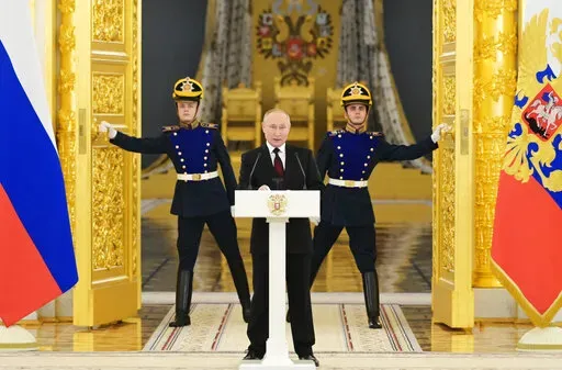 Russian President Vladimir Putin speaks during a ceremony to receive credentials from foreign ambassadors in Kremlin, in Moscow, Russia, Dec. 1, 2021. (Grigory Sysoev, Sputnik, Kremlin Pool Photo via AP)