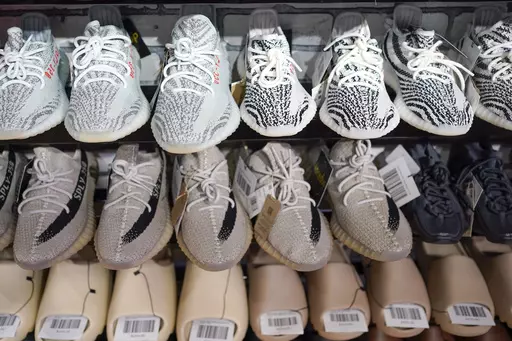 Yeezy shoes made by Adidas are displayed at Laced Up, a sneaker resale store, in Paramus, N.J., Tuesday, Oct. 25, 2022. Some of Adidas' remaining Yeezy shoes are back on sale, Wednesday, May 31, 2023, months after the German sportsware company cut ties with Ye, the rapper formerly known as Kanye West. (AP Photo/Seth Wenig)
