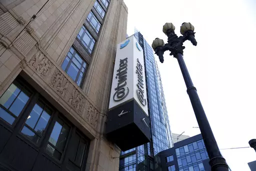 A sign is pictured outside the Twitter headquarters in San Francisco, Monday, April 25, 2022. Elon Musk reached an agreement to buy Twitter for roughly $44 billion on Monday, promising a more lenient touch to policing content on the platform where he promotes his interests, attacks critics and opines on social and economic issues to more than 83 million followers. (AP Photo/Jed Jacobsohn)