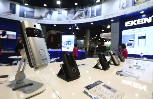 An EKEN doorbell camera, along with other models, are shown on display at CES International, Jan. 10, 2019, in Las Vegas. Some doorbell cameras sold by Amazon and other online retailers have security flaws that could allow bad actors to view footage from the devices or control them completely, according to an investigation published Thursday, Feb. 29, 2024, by Consumer Reports. (AP Photo/Ross D. Franklin, File)