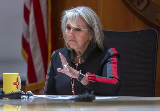 Gov. Michelle Lujan Grisham announces an order restricting people from carrying guns in Bernalillo County for 30 days during a news conference in the Governor's Office on Friday, Sept. 8, 2023 in Santa Fe, N.M. Grisham said she expects legal challenges but was compelled to act because of recent shootings, including the death of an 11-year-old boy outside a minor league baseball stadium this week.(Eddie Moore/The Albuquerque Journal via AP)