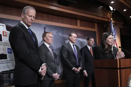 From left, Senate Majority Leader John Thune, R-S.D., Sen. James Lankford, R-Okla., Sen. Ted Budd, R-N.C., Sen. John Barrasso, R-Wyo., and Sen. Katie Britt, R-Ala., talk to reporters about the Laken Riley Act, a bill to detain unauthorized immigrants who have been accused of certain crimes, at the Capitol in Washington, Thursday, Jan. 9, 2025. Georgia nursing student Laken Riley was killed last year by a Venezuelan man who entered the U.S. illegally and was allowed to stay to pursue his immigrat
