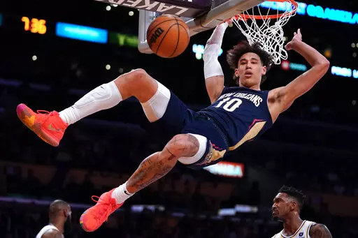 New Orleans Pelicans center Jaxson Hayes dunks during the first half of an NBA basketball game against the Los Angeles Lakers Sunday, Feb. 27, 2022, in Los Angeles. (AP Photo/Mark J. Terrill)