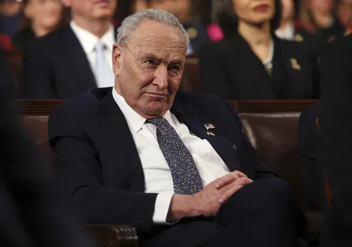 Senate Minority Leader Chuck Schumer, D-N.Y., listens as President Donald Trump addresses a joint session of Congress at the Capitol in Washington, Tuesday, March 4, 2025. (Win McNamee/Pool Photo via AP)