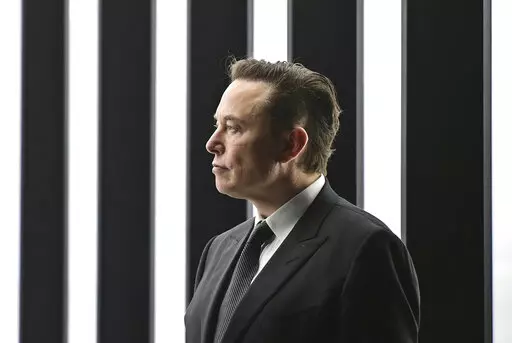 Elon Musk, Tesla CEO, attends the opening of the Tesla factory Berlin Brandenburg in Gruenheide, Germany, March 22, 2022. Elon Musk will be able to include new evidence from a Twitter whistleblower as he fights to get out of his $44 billion deal to buy the social media company, but Musk won’t be able to delay a high-stakes October trial over the dispute, a judge ruled Wednesday, Sept. 7, 2022. (Patrick Pleul/Pool via AP)