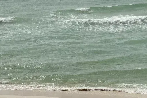 Waves approach the shore in Panama City Beach, Fla., on Tuesday, Jan. 10, 2017. On Saturday, June 22, 2024, authorities said three Alabama men have died from likely drowning after becoming distressed while swimming at a Florida Panhandle beach. (Andrew Wardlow/News Herald via AP, File)