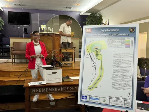 Lynda Van Davis, Greenfield's counsel and head of external affairs, announces that the company is "ceasing all plans" to build a grain export facility in the historic Black community of Wallace, La., in St. John the Baptist Parish, Tuesday, Aug. 6, 2024. (AP Photo/Jack Brook)