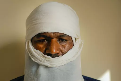 Mouhamadou Ibrahim, a former jihadi commander who decided to defect, poses for a photograph in Niamey, Niger, Friday, Aug. 18, 2023. The future of a program in Niger that encourages jihadi fighters to defect and reintegrate into society is unclear after mutinous soldiers toppled the government that launched it. (AP Photo/Sam Mednick)
