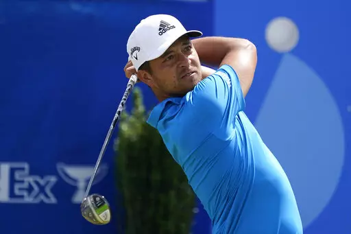 Xander Schauffele hits off the first tee during the second round of the PGA Zurich Classic golf tournament, Friday, April 22, 2022, at TPC Louisiana in Avondale, La. (AP Photo/Gerald Herbert)