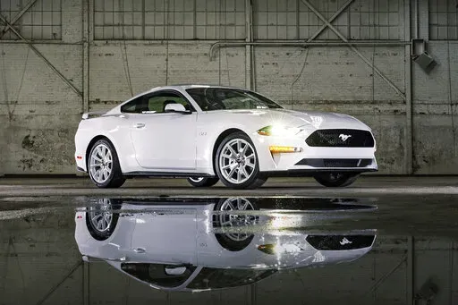 This photo provided by Ford, shows the 2022 Ford Mustang, an iconic pony car that has a few V8 engines to choose from. (Courtesy of Ford Motor Co. via AP)
