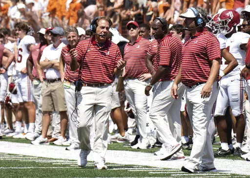 Alabama head coach Nick Saban talks on his headset during the second half an NCAA college football game against Texas, Saturday, Sept. 10, 2022, in Austin, Texas. Alabama won 20-19. (AP Photo/Michael Thomas)