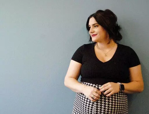 Britt Kahm poses for a photo at the Shreveport Times office in Shreveport, La on Dec. 14, 2021. (Meredith G. White/The Shreveport Times via AP)