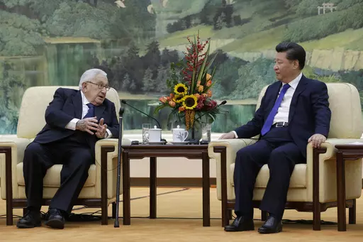 China's President Xi Jinping, right, listens to former U.S. Secretary of State Henry Kissinger, who led the China-U.S Track Two Dialogue, during a meeting at the Great Hall of the People in Beijing, China, Nov. 2, 2015. Kissinger, the diplomat with the thick glasses and gravelly voice who dominated foreign policy as the United States extricated itself from Vietnam and broke down barriers with China, died Wednesday, Nov. 29, 2023. He was 100. (Jason Lee/Pool Photo via AP, File)