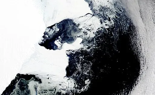 This satellite image provided by NASA, Aqua MODIS 12 on March 2022  shows the main piece of C-37 close to Bowman Island.  Scientists are concerned because an ice shelf the size of New York City collapsed in East Antarctica, an area that had long been thought to be stable. The collapse last week was the first time scientists have ever seen an ice shelf collapse in this cold area of Antarctica. (NASA via AP)