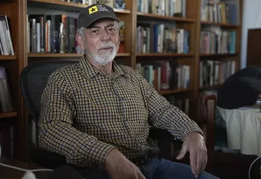 Journalist Gustavo Gorriti poses for a portrait at his home in Lima, Peru, Friday, April 26, 2024. Gorriti, 75, is one of Latin America’s most storied journalists with more than four decades of investigative reporting that exposed high-level abuse of power in Peru and abroad. (AP Photo/Martin Mejia)