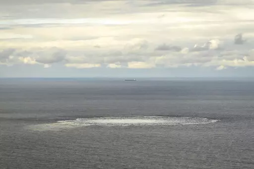In this photo provided by the Armed Forces of Denmark, a view the disturbance in the water above the gas leak,  in the Baltic Sea, Thursday, Sept. 29, 2022. Following the suspected sabotage this week of the Nord Stream 1 and 2 pipelines that carry Russian natural gas to Europe, there were two leaks off Sweden, including a large one above North Stream 1, and a smaller one above North Stream 2.  (Rune Dyrholm/Armed Forces of Denmark via AP)