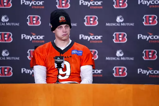 Cincinnati Bengals quarterback Joe Burrow speaks with the media, Wednesday, Jan. 4, 2023, in Cincinnati. Damar Hamlin was taken to the hospital after collapsing on the field during the Bill's NFL football game against the Cincinnati Bengals on Monday night. (Kareem Elgazzar/The Cincinnati Enquirer via AP)