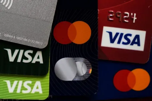 Several VISA and MASTER credit cards are shown in Buffalo Grove, Ill., Thursday, Feb. 8, 2024. (AP Photo/Nam Y. Huh, File)