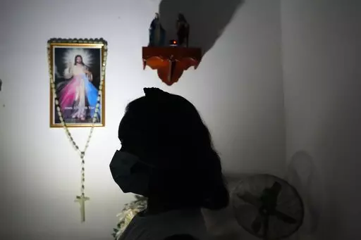 Hasini Wasana, a renal transplant patient, sits in her home in Negombo, outskirts of Colombo, Sri Lanka, June 19, 2022. Wasana had been diagnosed with a kidney ailment as a toddler and underwent a transplant nine months ago. She has to take a tablet for lifetime, an immunosuppressant to stop her body from rejecting the transplanted kidney. The government has no dollars to import them  and Wasana's family is dependent on donors because is too expensive in the private sector. Sri Lanka is bankrupt