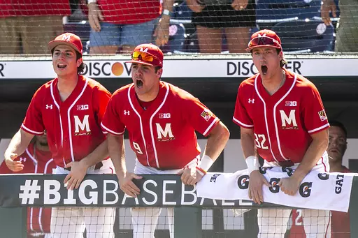 Maryland's Simmi Whitehill, center, cheers on teammates during an NCAA college baseball game against Nebraska, Saturday, May 27, 2023, in Omaha, Neb. (Joseph Cress/Iowa City Press-Citizen via AP)