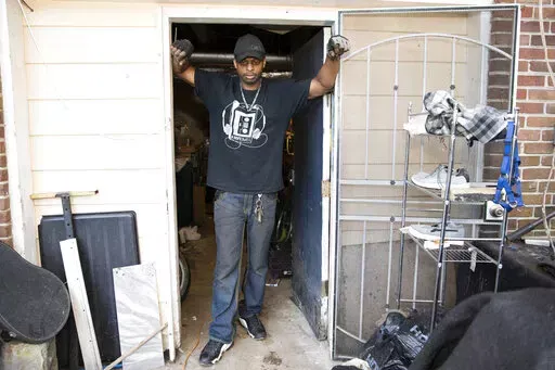 Prince Beatty is photographed on Monday, Jan. 10, 2022, in East Point, Ga.  Beatty, a 47-year-old Navy veteran, faces eviction this month for unpaid rent despite his landlord getting more than $20,000 in federal rental assistance.  (AP Photo/Hakim Wright Sr.)