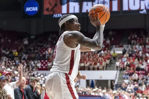 Alabama guard Latrell Wrightsell Jr. (3) looks to shoot a 3-point basket during the second half of an NCAA college basketball game against McNeese State, Monday, Nov. 11, 2024, in Tuscaloosa, Ala. (AP Photo/Vasha Hunt)