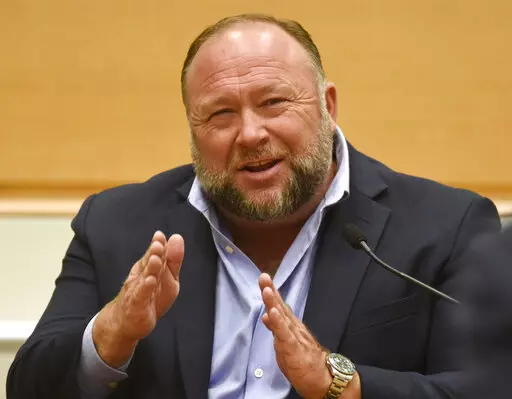 Infowars founder Alex Jones takes the witness stand to testify at the Sandy Hook defamation damages trial at Connecticut Superior Court in Waterbury, Conn. Thursday, Sept. 22, 2022. A Connecticut jury’s ruling that Jones pay $965 to people he targeted with Sandy Hook lies is heartening to people disgusted by the muck of disinformation. Just don’t expect conspiracy theories to go away.  (Tyler Sizemore/Hearst Connecticut Media via AP, Pool, File)