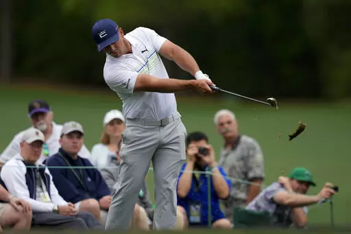 Bryson DeChambeau hits on the 12th tee during a practice round for the Masters golf tournament on Wednesday, April 6, 2022, in Augusta, Ga. (AP Photo/Matt Slocum)