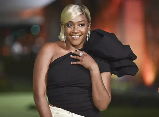 Tiffany Haddish appears at the Academy Museum of Motion Pictures Gala in Los Angeles on Sept. 25, 2021. Haddish’s next book will be in part a story of laughing through the tears. Her essay collection “I Curse You With Joy” is scheduled for Nov. 29. (Photo by Richard Shotwell/Invision/AP, File)