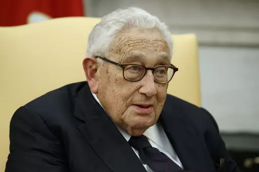 Former Secretary of State Henry Kissinger speaks during a meeting with President Donald Trump in the Oval Office of the White House, Tuesday, Oct. 10, 2017, in Washington. Kissinger marks his 100th birthday on Saturday, May 27, 2023, outlasting many of his political contemporaries who guided the United States through one of its most tumultuous periods including the presidency of Richard Nixon and the Vietnam War. (AP Photo/Evan Vucci, File)