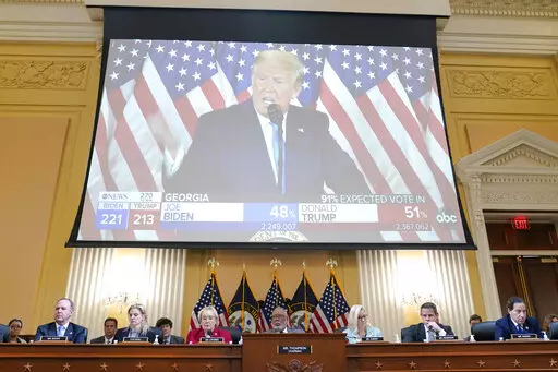 A video exhibit plays as the House select committee investigating the Jan. 6 attack on the U.S. Capitol continues to reveal its findings of a year-long investigation, at the Capitol in Washington, Monday, June 13, 2022. (AP Photo/Susan Walsh)