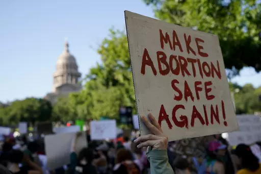 Demonstrators march and gather near the state capitol following the Supreme Court's decision to overturn Roe v. Wade, Friday, June 24, 2022, in Austin, Texas. A pregnant Texas woman whose fetus has a fatal diagnosis asked a court Tuesday, Dec. 5, 2023, to let her terminate the pregnancy, bringing what her attorneys say is the first lawsuit of its kind in the U.S. since Roe v. Wade was overturned last year. (AP Photo/Eric Gay, File)
