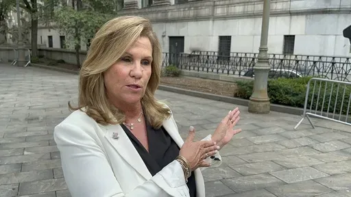 Terry Strada, national chair of 9/11 Families United, speaks outside Manhattan federal court on Wednesday, July 31, 2024, shortly after plea deals were announced for three men charged in the Sept. 11 attacks. (AP Photo/Lawrence Neumeister)