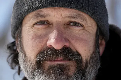 Eric Anderson, a biological science technician for the National Parks Service, who was fired last week poses for a photo Thursday, Feb. 20, 2025, in Chicago. (AP Photo/Nam Y. Huh)