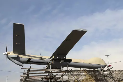 In this Feb. 11, 2016 file photo, Iranian drone Shahed-129 is displayed at a rally in Tehran, Iran. The White House on Monday, May 15, 2023, said that Russia is looking to buy additional advanced attack drones from Iran for use in the Kremlin's war in Ukraine after using up most of the 400 drones it had previously purchased from Tehran. “Iran also continues to provide Russia with one-way attack UAVs (unmanned aerial vehicles). Since August, Iran has provided Russia with more than 400 UAVs prim