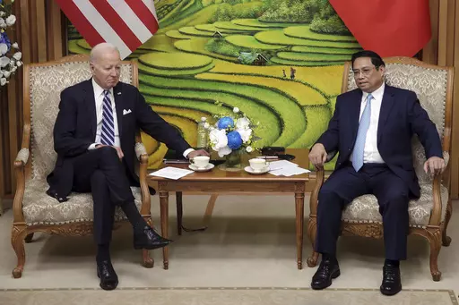 Vietnamese Prime Minister Pham Minh Chinh, right, meets with U.S. President Joe Biden at the Government Office in Hanoi, Vietnam, Monday, Sept. 11, 2023. (AP Photo/Minh Hoang, Pool)