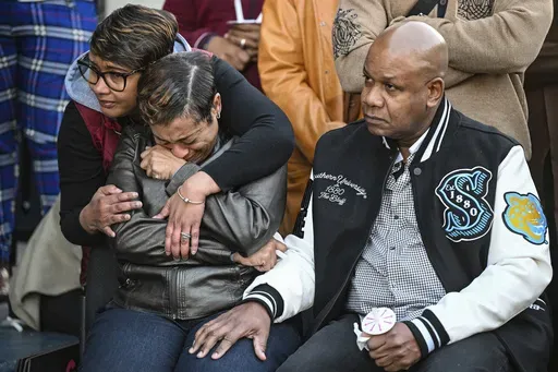 Corey Wilson, right, mourns alongside other grieving family members during a vigil for his son, Caleb Wilson, outside of Southern University's Smith-Brown Student Union on March 5, 2025, in Baton Rouge, La. (Javier Gallegos/The Advocate via AP, file)