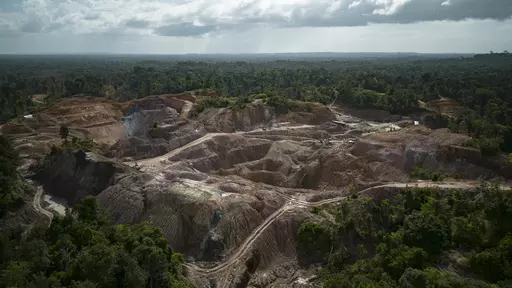 An aerial view of the Tassawini gold mining operation, in Chinese Landing, Guyana, Monday, April 17, 2023. The mining operation spans 3,400 acres or 1,380 hectares. (AP Photo/Matias Delacroix)