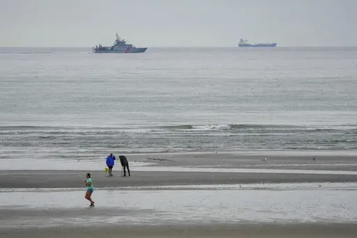 A vessel of the French Gendarmerie Nationale patrols in front of the Wimereux beach, France, Wednesday, Sept. 4, 2024. (AP Photo/Nicholas Garriga, File)
