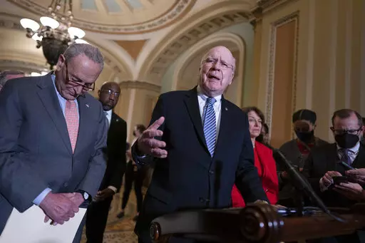 From left, Senate Majority Leader Chuck Schumer, D-N.Y., Sen. Raphael Warnock, D-Ga., Sen. Patrick Leahy, D-Vt., chair of the Senate Appropriations Committee, and Sen. Amy Klobuchar, D-Minn., chair of the Senate Rules Committee, talk about the need for the John Lewis Voting Rights Advancement Act, as they speak to reporters following a Democratic policy meeting at the Capitol in Washington, Nov. 2, 2021. Democrats are mounting an impassioned push to overhaul Senate rules that stand in the way of