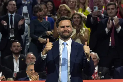 Republican vice presidential candidate Sen. JD Vance, R-Ohio, attends the first day of the Republican National Convention, Monday, July 15, 2024, in Milwaukee. (AP Photo/Evan Vucci)