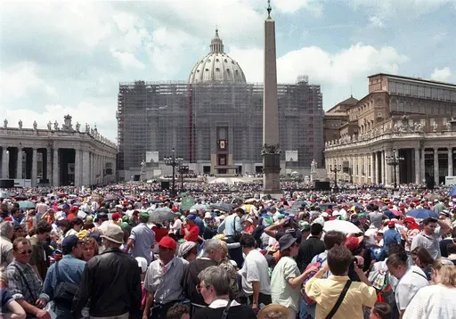 Pilgrims crowd St. Peter's Square at the Vatican, Saturday, May 30, 1998, on Pentecost Day. (AP Photo/Andrew Medichini, File)