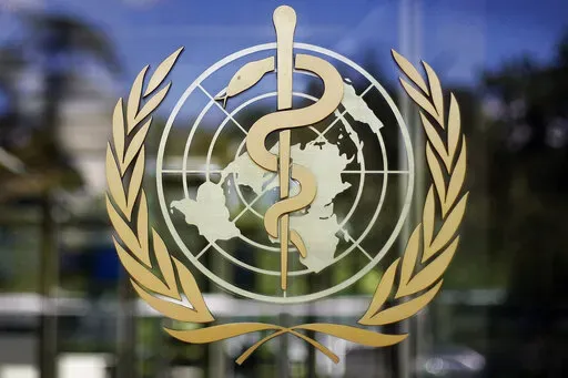 The logo of the World Health Organization is seen at the WHO headquarters in Geneva, Switzerland, June 11, 2009. The World Health Organization chief on Tuesday, Feb. 1, 2022 says 90 million cases of coronavirus have been reported since the omicron variant was first identified 10 weeks ago, amounting to more than in all of 2020, the first year of the COVID-19 pandemic. (AP Photo/Anja Niedringhaus, File)