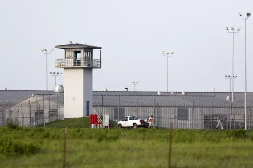 An inmate works outdoors during the hot summer outside a Texas prison unit in Huntsville, Texas, on June 25, 2015. (Rose Baca/The Dallas Morning News via AP, File)